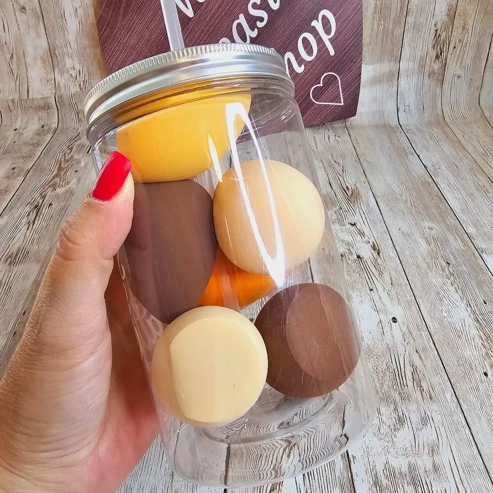 Pumpkin spice latte cup with makeup sponges